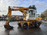 1982 Poclain P60 wheel excavator, side view