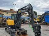 2021 Volvo EC60E mini excavator, front three-quarter view