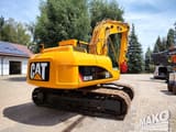 2011 Caterpillar M315D crawler excavator, rear three-quarter view