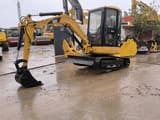 Caterpillar 303CR mini excavator, side view