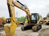 2020 Caterpillar 320E crawler excavator, front three-quarter view