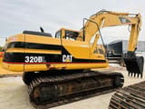 2018 Caterpillar 320BL crawler excavator, rear three-quarter view