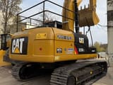 2025 Caterpillar 323D2L crawler excavator, rear three-quarter view