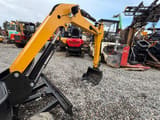 JPC KV15 mini excavator, side view of boom and bucket