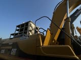 2010 Caterpillar 325BL crawler excavator side view