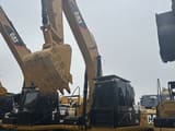2024 Caterpillar 323D2L crawler excavator, front three-quarter view
