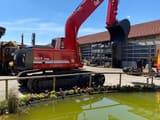 1999 O&K RH9 crawler excavator, side view