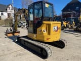 2023 Caterpillar 305 CR mini excavator, rear three-quarter view
