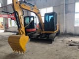 Caterpillar 307E mini excavator, front three-quarter view