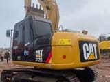 2023 Caterpillar 312D mini excavator, rear three-quarter view