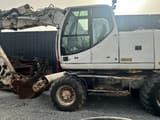 2005 CASE WX165 wheel excavator, side view