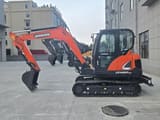 2024 Doosan DX60-9C mini excavator side view