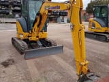 2024 Komatsu PC35MR-5 mini excavator, front three-quarter view