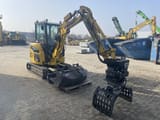 2024 Komatsu PC33E-6 mini excavator, front three-quarter view