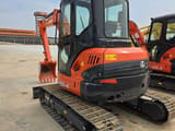 2021 Kubota U55-4 mini excavator, rear three-quarter view