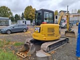 2020 Caterpillar 305E2 mini excavator, rear three-quarter view