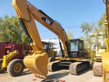 2023 Caterpillar 330D crawler excavator, side view
