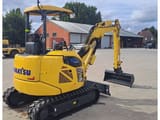 2024 Komatsu PC33E-6 mini excavator, rear three-quarter view
