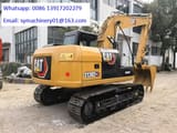 2023 Caterpillar 313D2 GC crawler excavator, rear three-quarter view