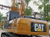 2024 Caterpillar 324DL crawler excavator, rear three-quarter view