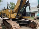 2010 Caterpillar 349D crawler excavator, side view