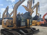 Caterpillar 308E crawler excavator, front three-quarter view