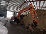 2002 Kubota KX101-3 mini excavator, front three-quarter view