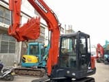 2022 Doosan DX55-9C mini excavator, front three-quarter view