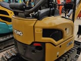 2026 XCMG XE17U Mini Excavator with a close-up of the rear engine cover and side panel.