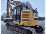 2018 Caterpillar 315F crawler excavator, rear three-quarter view