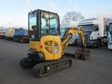 2013 Komatsu PC26MR-3 mini excavator, rear three-quarter view