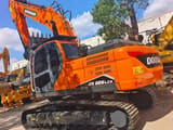 2024 Doosan DX 225 LCA crawler excavator, rear three-quarter view