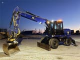 2014 Caterpillar M313D wheel excavator, side view