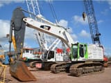 2014 Caterpillar 374FL crawler excavator, side view