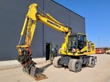 2023 Komatsu PW180-11E0 wheel excavator, side view