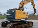 Hyundai 235 crawler excavator, rear three-quarter view