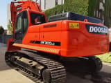 2023 Doosan DX300LC crawler excavator, rear three-quarter view