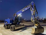 2014 Caterpillar M313D wheel excavator, side profile view