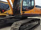 2023 Hyundai R305LC-9T crawler excavator, side view of cab and tracks