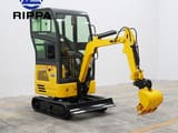 2026 Rippa R327 Mini Excavator with the boom arm retracted and a prominent dozer blade.