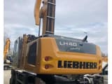 2017 Liebherr LH40 M material handler, rear three-quarter view