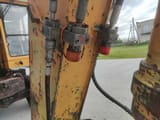 1992 Caterpillar 214 B wheel excavator hydraulic lines detail