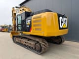 2011 Caterpillar 329E crawler excavator, rear three-quarter view