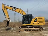 2021 Caterpillar 320GC crawler excavator, side profile view