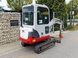 2012 Takeuchi TB219 mini excavator, rear three-quarter view