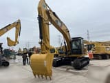 2024 Caterpillar 323D crawler excavator, front three-quarter view