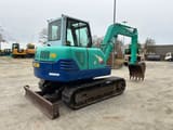 IHI 60NS mini excavator, rear three-quarter view