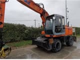 2002 New Holland EX165W wheel excavator, side view