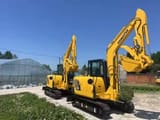 2024 Komatsu PC56-7 mini excavator, three-quarter view