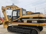 2005 Caterpillar 320BL crawler excavator side view